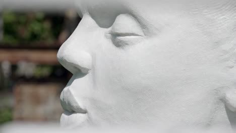 profile of a face made of white marble at lasa marmo, laas - lasa, south tyrol, italy