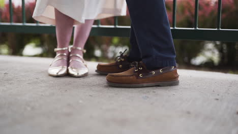 close up of a young couple wearing stylish shoes