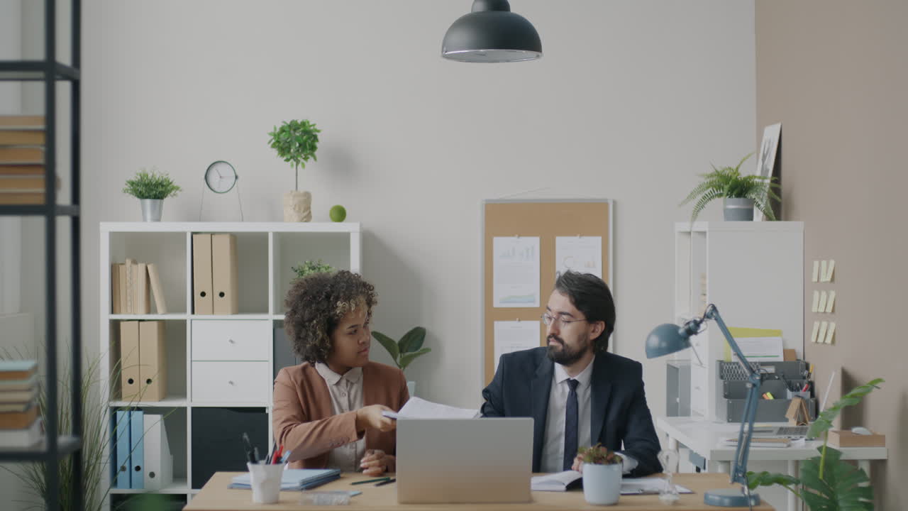 Business colleagues collaborating in an office