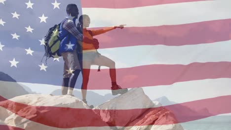 Animation-of-american-flag-moving-over-couple-hiking