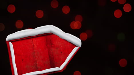 animación digital de un cartel rojo cubierto de nieve contra manchas rojas de luces