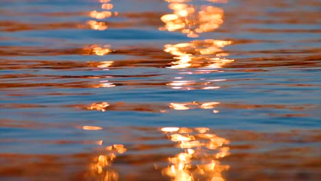 the light is reflected in the water, in the gold color