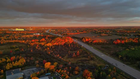 aerial movement fall morning light over a highway