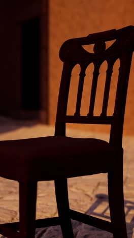 antique wooden chair in the sunset