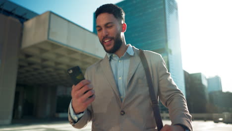 Walking,-phone-or-businessman-winner-in-city