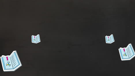 animación de los iconos de los libros escolares y el espacio de copia sobre fondo negro