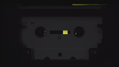 An-old-cassette-player-is-playing-the-first-track-on-the-cassette-tape
