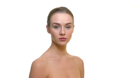 portrait of young beautiful naked women on a white studio background