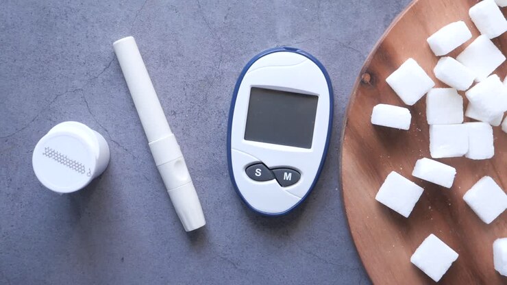 Diabetes Monitoring Supplies and Sugar Cubes