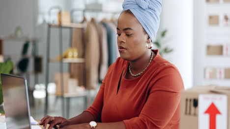 Black-woman,-laptop-and-typing-in-logistics