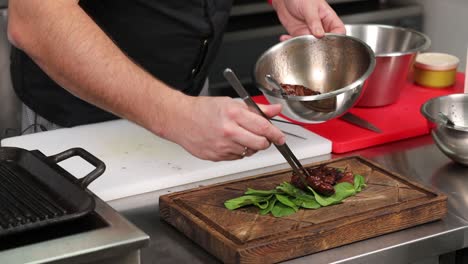 chef preparing grilled meat dishes