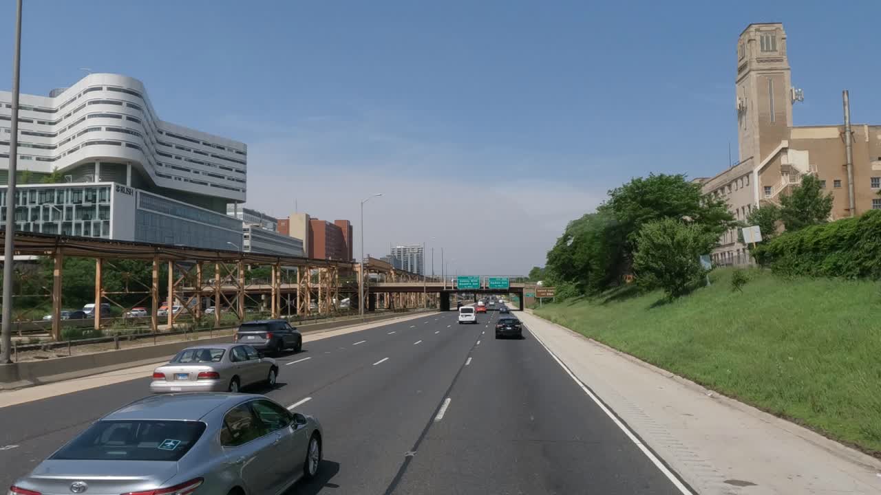 Highway with traffic and buildings