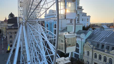 kyiv, ukraine in the morning at dawn: ferris wheel