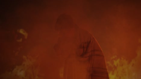 person amidst fire and smoke
