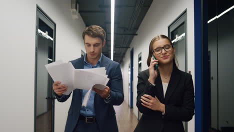 upset businesswoman talking smartphone explaining unsuccessful results on call.