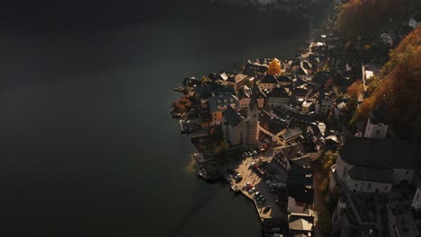 aerial view over hallstatt austria during autumn season, above hallstatt during fall 4k