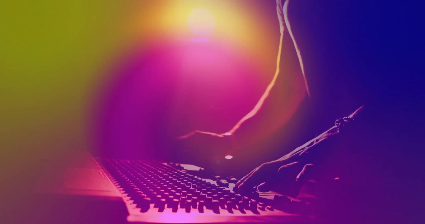 Audio engineer approaching board twisting knobs sliding faders amid lens flare balancing levels