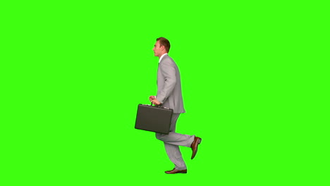 Businessman-running-on-green-screen-