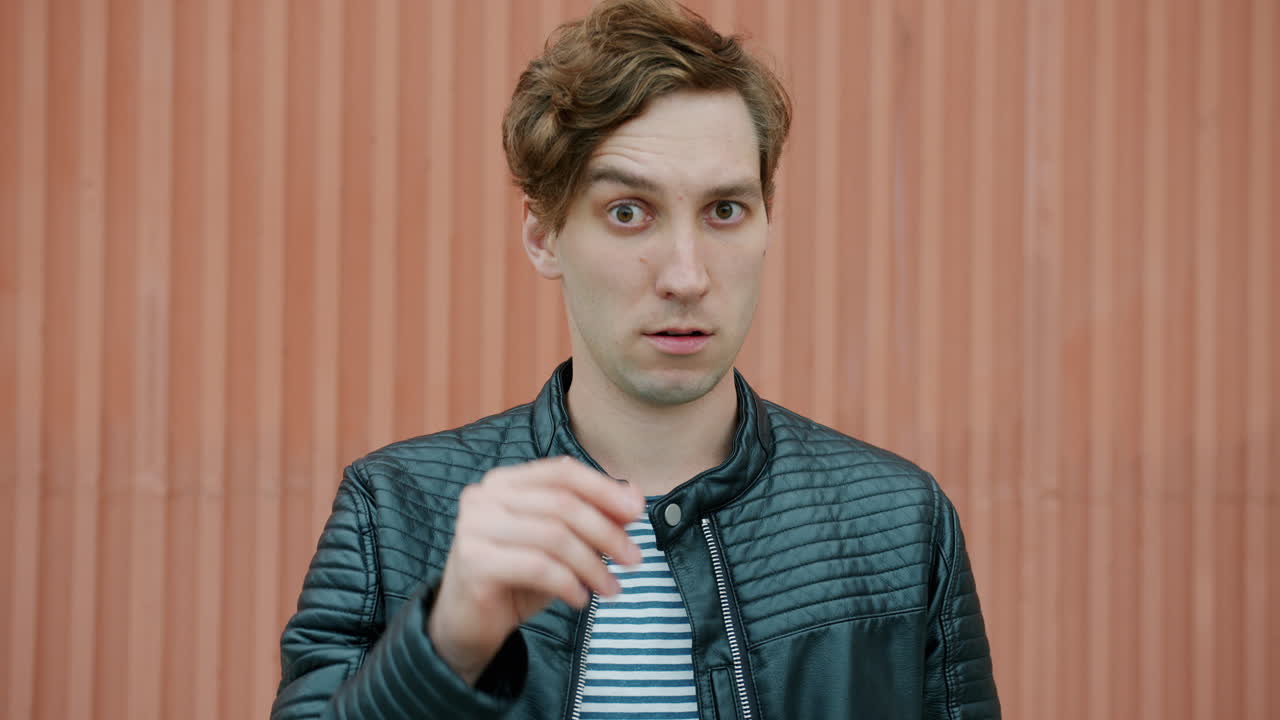 Man Expressing Confusion and Frustration