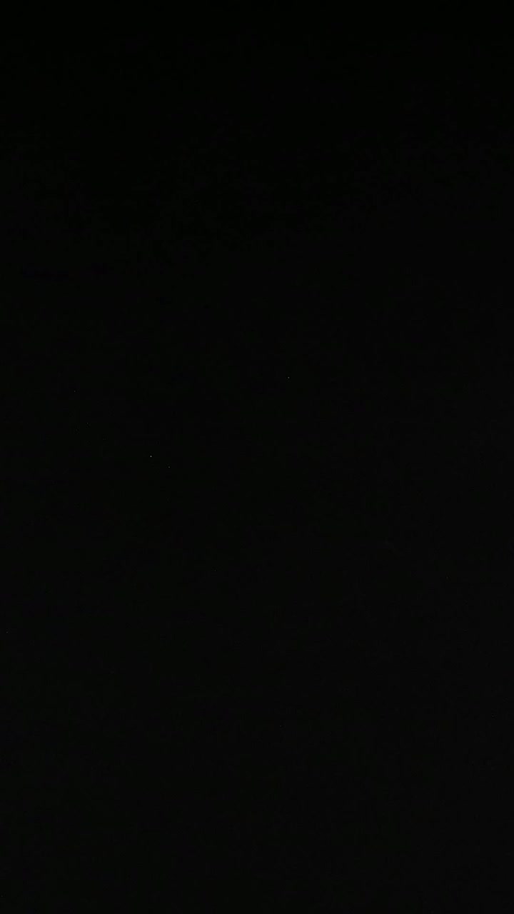 Orange ball moves across a dark background