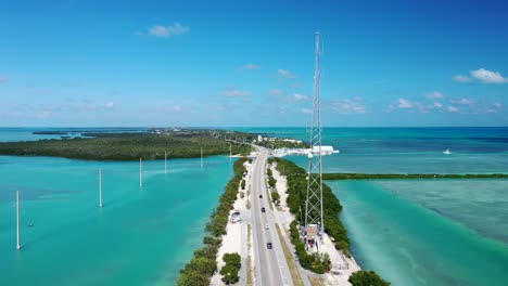 cars driving through overseas highway spanning the florida keys in usa