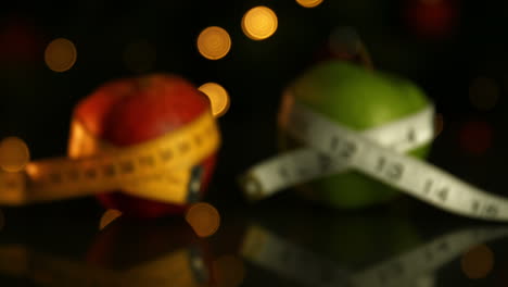 Apples-wrapped-in-measuring-tape