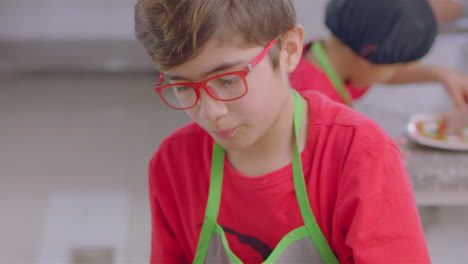 minichef kid preparing a fillet mignon or cordon blue