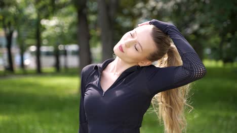 woman stretching in a park