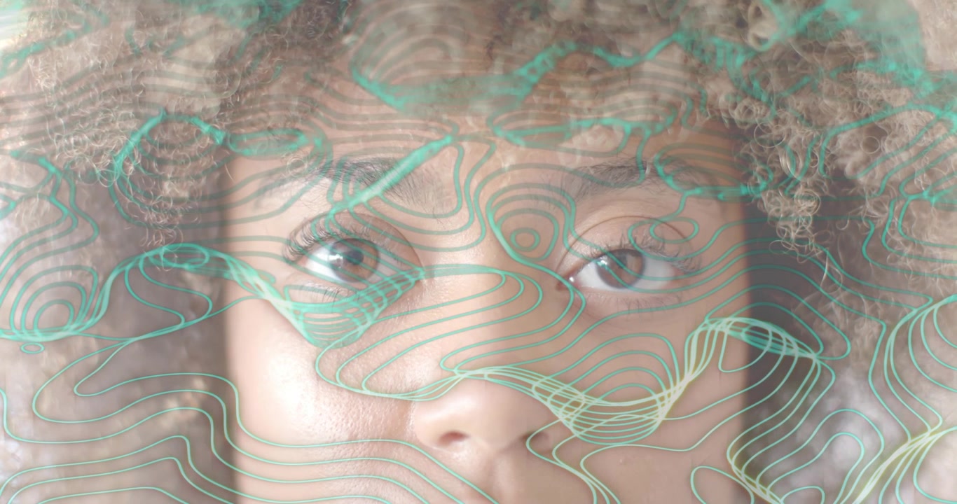 Woman closing then opening eyes, with teal lines flowing across face for facial mapping tech