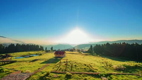 Time-lapse-of-Beautiful-green-nature-and-mist-flows-around-the-mountains-in-the-morning-with-sunshine