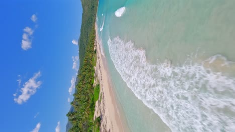 crazy drone flying over turquoise ocean waters of playa rincon beach in dominican republic