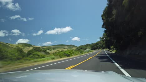 Driving-through-beautiful-scenery-on-a-sunny-day-in-California,-USA