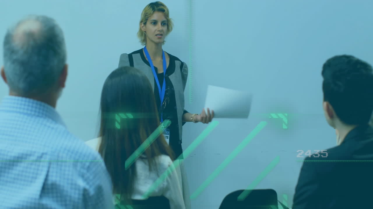 Businesswoman presenting data processing animation over audience in conference room