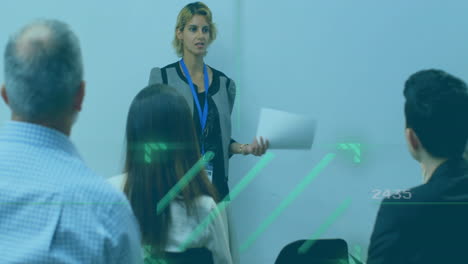 businesswoman presenting data processing animation over audience in conference room