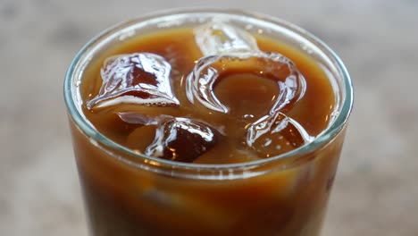 close up of a glass of iced coffee