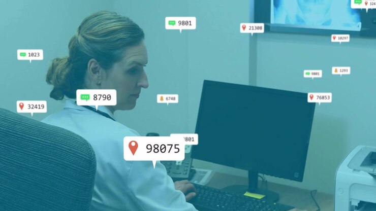 Doctor picking up phone and typing for patient monitoring with animated labels floating in clinic