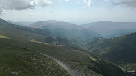 A-breathtaking-panorama-of-a-mountainous-landscape-with-lush-green-valleys-and-dense-forests