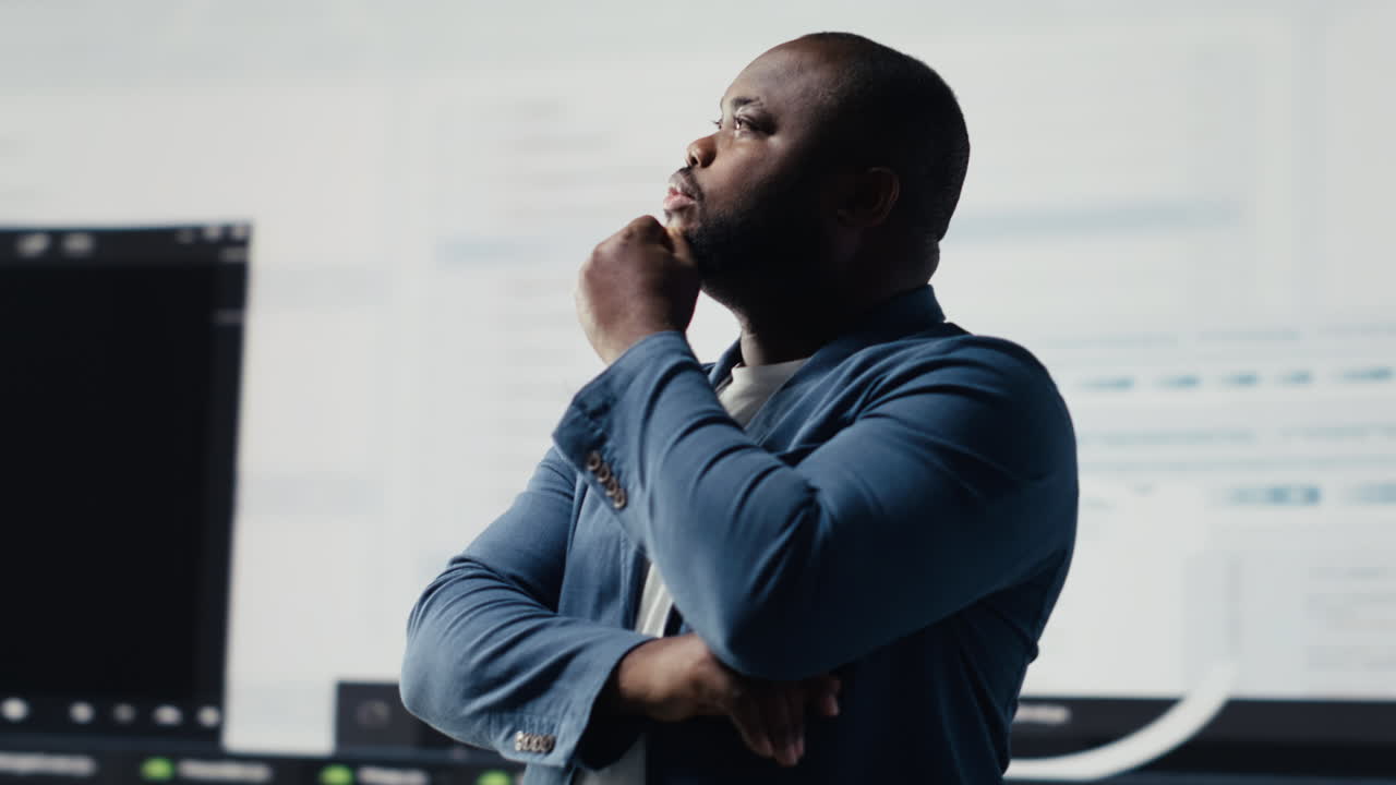 African American engineer analyzing programming language for automation