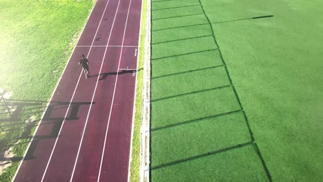 person running on a track