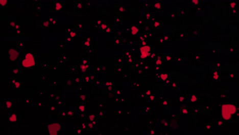 Red-hearts-floating-around-on-a-black-background