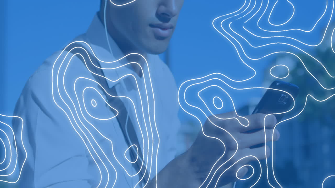 Animation of moving shapes over man using smartphone