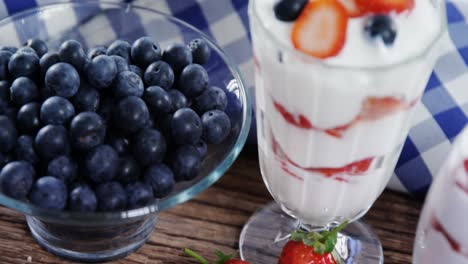 fruit ice creams on wooden table