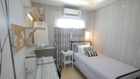 monochrome chic and stylish wooden wall bedroom decoartion with single bed