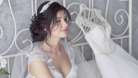 lady-with-white-veil-and-tiara-on-hairstyle-slow-motion