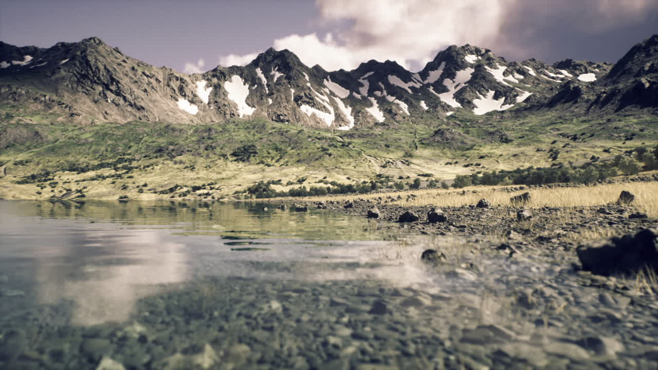 Peaceful highland basin reflects gentle sunlight and greenery