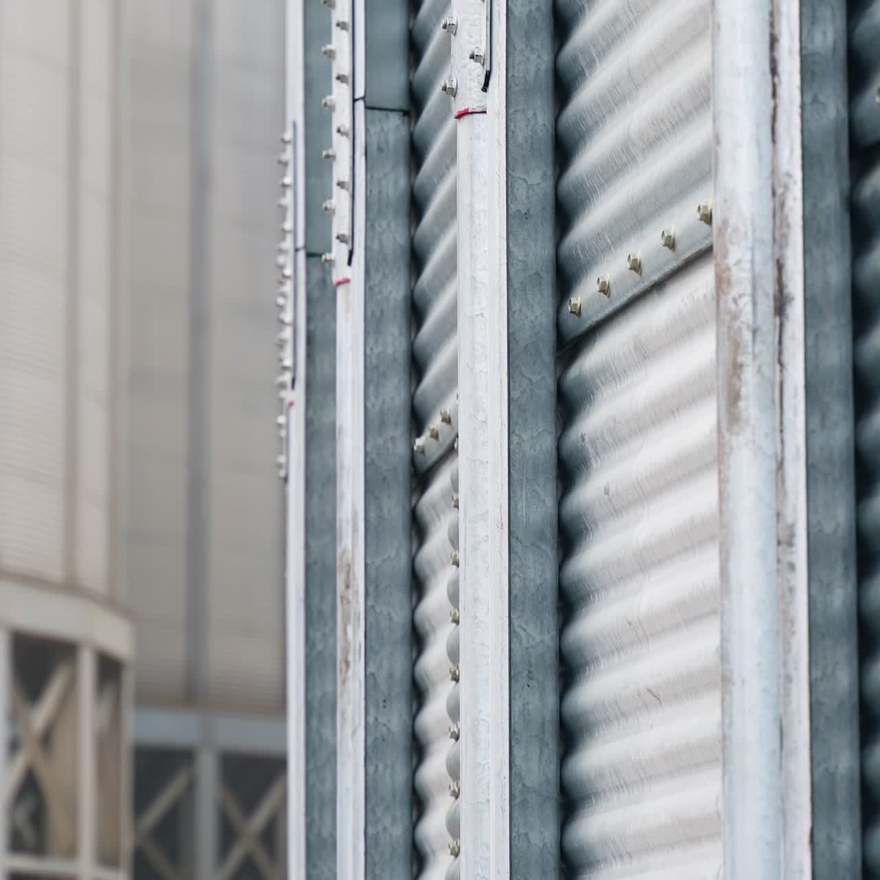 Industrial metal agricultural equipment. Close up view factory elevator construction