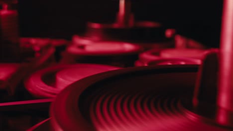 close-up of industrial machinery in red light