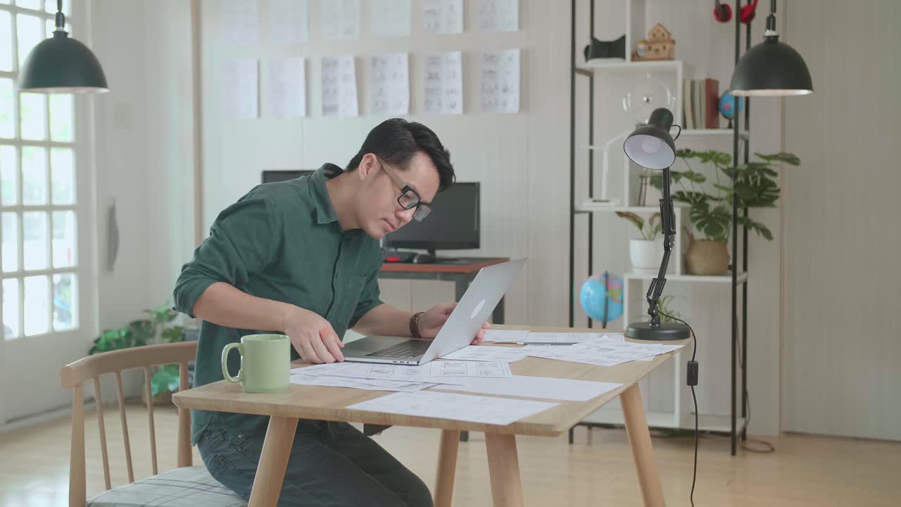 Asian Man Works With Laptop Computer And Storyboard. Stand Up And Walking Out Frame, Comics Compilation, Application Ui Or Game Plot