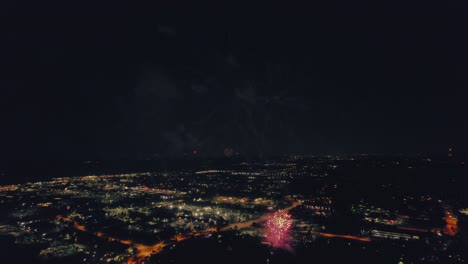 orbiting-aerial-of-Spectacular-fireworks-4th-of-July-in-Vernon-Hills-Illinois-USA---century-park---with-a-retro-vintage-vibe-color-grading