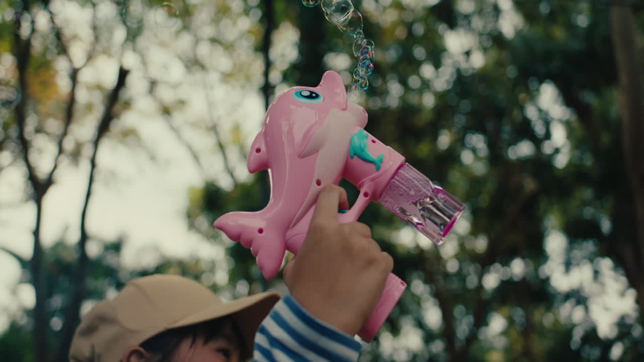 Pink Dolphin Bubble Gun in a Park